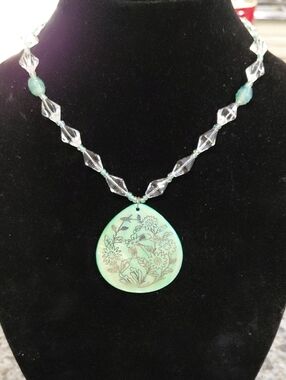 Green Floral Mother of Pearl Teardrop Pendant Necklace with Clear Beaded Chain.